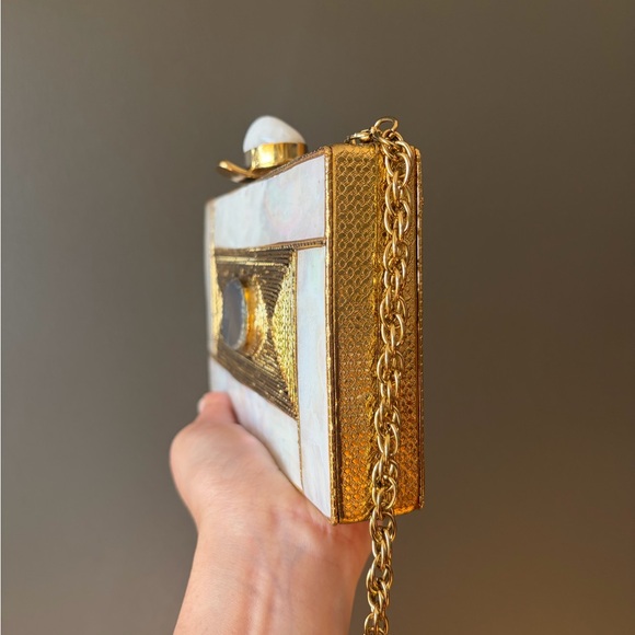 Elegant Gold and Cream Clutch